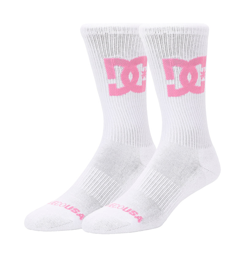 The Big Star Logo Crew Socks 3-Pack by DC Shoes features white crew socks with a large pink DC Shoes logo on the sides, "DC SHOES" text in pink near the toes, ribbed cuffs, and reinforced heels and toes.