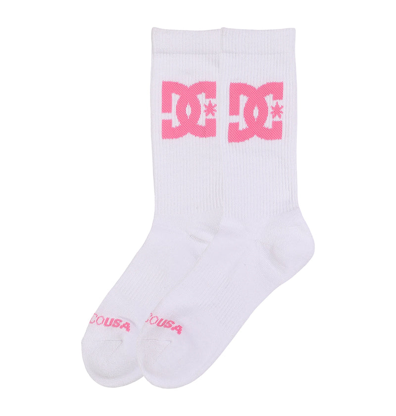 The Big Star Logo Crew Socks 3-Pack by DC Shoes includes white crew socks with a large pink DC logo near the top and "DC USA" in pink text by the toes.