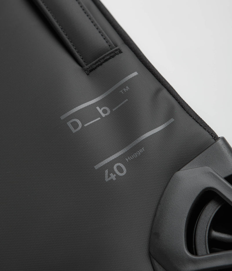 D_b_ Hugger 40L Carry-On Roller Bag in Black Out