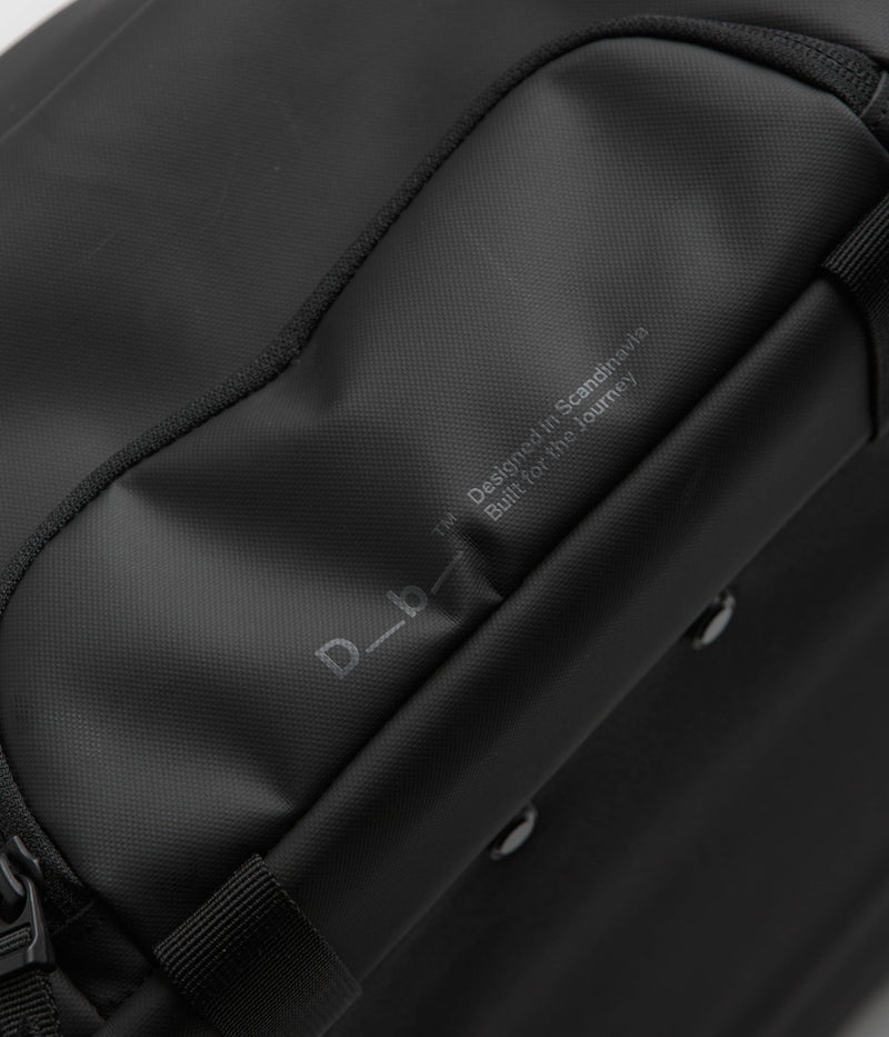 D_b_ Hugger 40L Carry-On Roller Bag in Black Out