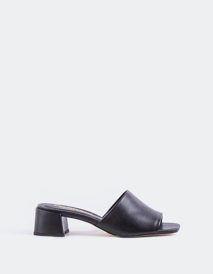 Timeless Low Thick-Heeled Mule
This low thick-heeled mule is the epitome of effortless style and comfort. With its sturdy, wide heel, it offers both stability and support without sacrificing elegance. The open-back design provides ease of wear, making it the perfect go-to shoe for everyday occasions. Whether paired with casual jeans or dressed up with a skirt or dress, this versatile mule offers a chic yet practical solution for all-day wear.

Detail(s):&nbsp;

Square Toe

1.75”&nbsp; Block Heel

We recomme