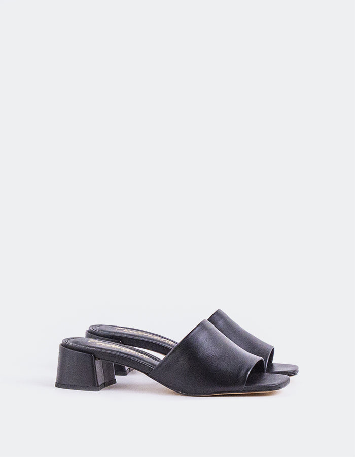 Timeless Low Thick-Heeled Mule
This low thick-heeled mule is the epitome of effortless style and comfort. With its sturdy, wide heel, it offers both stability and support without sacrificing elegance. The open-back design provides ease of wear, making it the perfect go-to shoe for everyday occasions. Whether paired with casual jeans or dressed up with a skirt or dress, this versatile mule offers a chic yet practical solution for all-day wear.

Detail(s):&nbsp;

Square Toe

1.75”&nbsp; Block Heel

We recomme