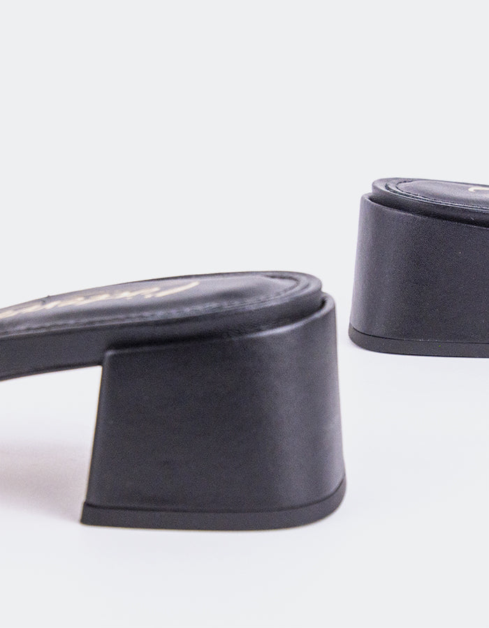 Timeless Low Thick-Heeled Mule
This low thick-heeled mule is the epitome of effortless style and comfort. With its sturdy, wide heel, it offers both stability and support without sacrificing elegance. The open-back design provides ease of wear, making it the perfect go-to shoe for everyday occasions. Whether paired with casual jeans or dressed up with a skirt or dress, this versatile mule offers a chic yet practical solution for all-day wear.

Detail(s):&nbsp;

Square Toe

1.75”&nbsp; Block Heel

We recomme