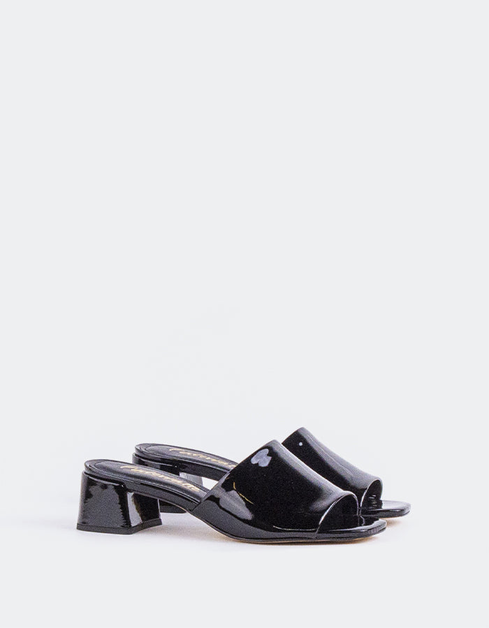 Timeless Low Thick-Heeled Mule
This low thick-heeled mule is the epitome of effortless style and comfort. With its sturdy, wide heel, it offers both stability and support without sacrificing elegance. The open-back design provides ease of wear, making it the perfect go-to shoe for everyday occasions. Whether paired with casual jeans or dressed up with a skirt or dress, this versatile mule offers a chic yet practical solution for all-day wear.

Detail(s):&nbsp;

Square Toe

1.75”&nbsp; Block Heel

We recomme