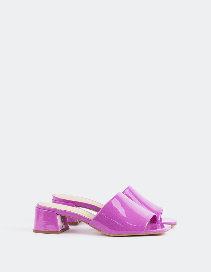 Timeless Low Thick-Heeled Mule
This low thick-heeled mule is the epitome of effortless style and comfort. With its sturdy, wide heel, it offers both stability and support without sacrificing elegance. The open-back design provides ease of wear, making it the perfect go-to shoe for everyday occasions. Whether paired with casual jeans or dressed up with a skirt or dress, this versatile mule offers a chic yet practical solution for all-day wear.

Detail(s):&nbsp;

Square Toe

1.75”&nbsp; Block Heel

We recomme