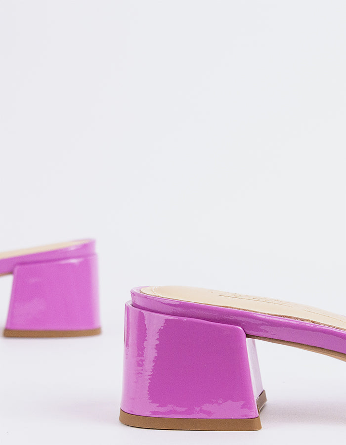 Timeless Low Thick-Heeled Mule
This low thick-heeled mule is the epitome of effortless style and comfort. With its sturdy, wide heel, it offers both stability and support without sacrificing elegance. The open-back design provides ease of wear, making it the perfect go-to shoe for everyday occasions. Whether paired with casual jeans or dressed up with a skirt or dress, this versatile mule offers a chic yet practical solution for all-day wear.

Detail(s):&nbsp;

Square Toe

1.75”&nbsp; Block Heel

We recomme
