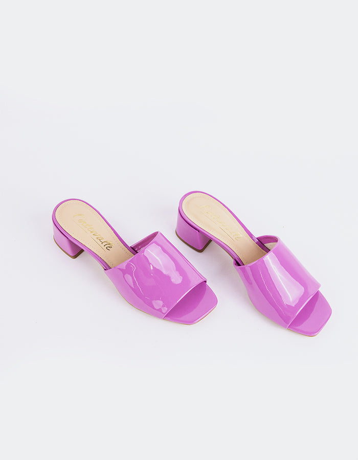 Timeless Low Thick-Heeled Mule
This low thick-heeled mule is the epitome of effortless style and comfort. With its sturdy, wide heel, it offers both stability and support without sacrificing elegance. The open-back design provides ease of wear, making it the perfect go-to shoe for everyday occasions. Whether paired with casual jeans or dressed up with a skirt or dress, this versatile mule offers a chic yet practical solution for all-day wear.

Detail(s):&nbsp;

Square Toe

1.75”&nbsp; Block Heel

We recomme