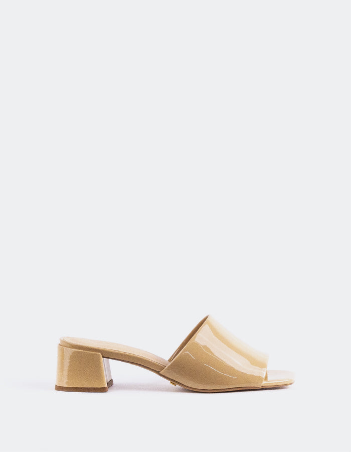 Timeless Low Thick-Heeled Mule
This low thick-heeled mule is the epitome of effortless style and comfort. With its sturdy, wide heel, it offers both stability and support without sacrificing elegance. The open-back design provides ease of wear, making it the perfect go-to shoe for everyday occasions. Whether paired with casual jeans or dressed up with a skirt or dress, this versatile mule offers a chic yet practical solution for all-day wear.

Detail(s):&nbsp;

Square Toe

1.75”&nbsp; Block Heel

We recomme