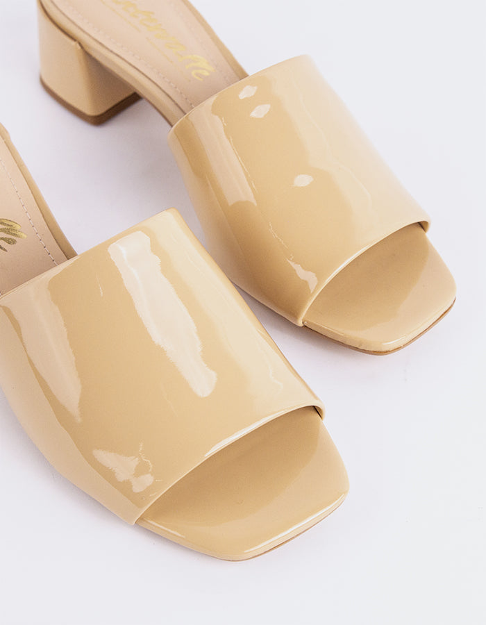 Timeless Low Thick-Heeled Mule
This low thick-heeled mule is the epitome of effortless style and comfort. With its sturdy, wide heel, it offers both stability and support without sacrificing elegance. The open-back design provides ease of wear, making it the perfect go-to shoe for everyday occasions. Whether paired with casual jeans or dressed up with a skirt or dress, this versatile mule offers a chic yet practical solution for all-day wear.

Detail(s):&nbsp;

Square Toe

1.75”&nbsp; Block Heel

We recomme