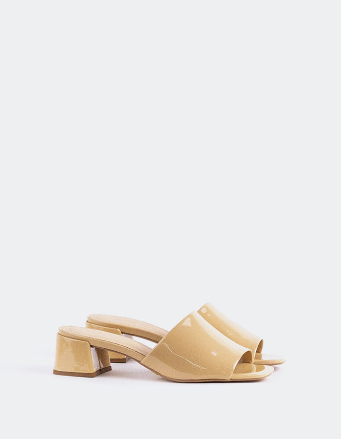 Timeless Low Thick-Heeled Mule
This low thick-heeled mule is the epitome of effortless style and comfort. With its sturdy, wide heel, it offers both stability and support without sacrificing elegance. The open-back design provides ease of wear, making it the perfect go-to shoe for everyday occasions. Whether paired with casual jeans or dressed up with a skirt or dress, this versatile mule offers a chic yet practical solution for all-day wear.

Detail(s):&nbsp;

Square Toe

1.75”&nbsp; Block Heel

We recomme