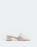 Timeless Low Thick-Heeled Mule
This low thick-heeled mule is the epitome of effortless style and comfort. With its sturdy, wide heel, it offers both stability and support without sacrificing elegance. The open-back design provides ease of wear, making it the perfect go-to shoe for everyday occasions. Whether paired with casual jeans or dressed up with a skirt or dress, this versatile mule offers a chic yet practical solution for all-day wear.

Detail(s):&nbsp;

Square Toe

1.75”&nbsp; Block Heel

We recomme
