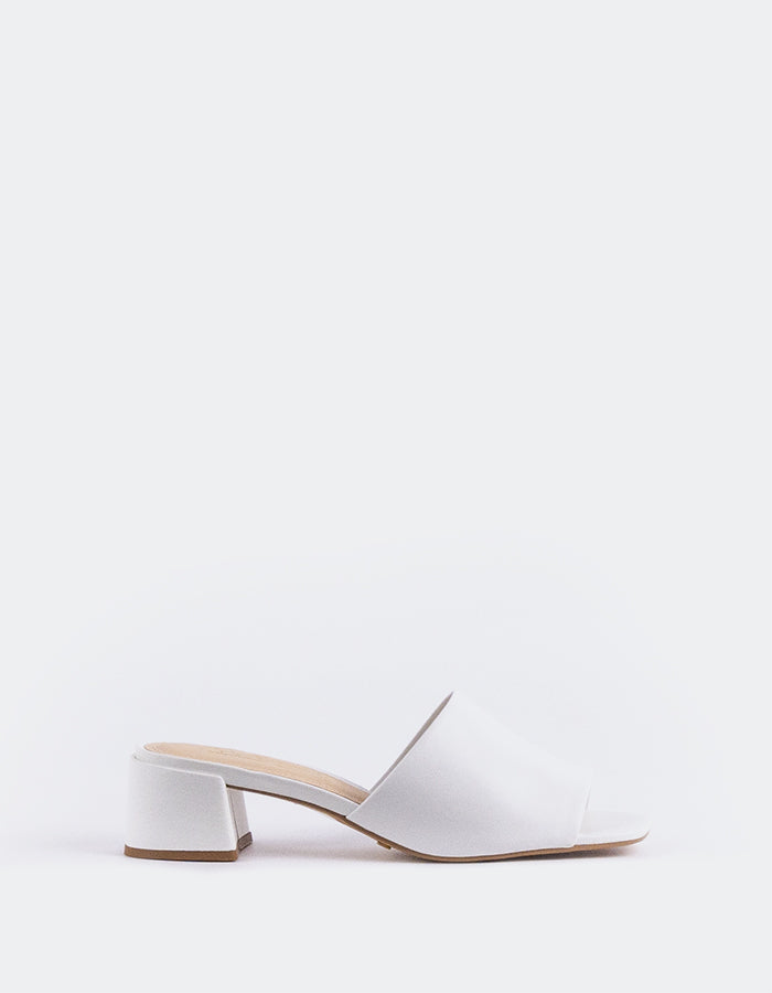 Timeless Low Thick-Heeled Mule
This low thick-heeled mule is the epitome of effortless style and comfort. With its sturdy, wide heel, it offers both stability and support without sacrificing elegance. The open-back design provides ease of wear, making it the perfect go-to shoe for everyday occasions. Whether paired with casual jeans or dressed up with a skirt or dress, this versatile mule offers a chic yet practical solution for all-day wear.

Detail(s):&nbsp;

Square Toe

1.75”&nbsp; Block Heel

We recomme