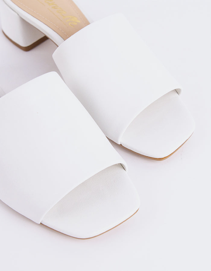 Timeless Low Thick-Heeled Mule
This low thick-heeled mule is the epitome of effortless style and comfort. With its sturdy, wide heel, it offers both stability and support without sacrificing elegance. The open-back design provides ease of wear, making it the perfect go-to shoe for everyday occasions. Whether paired with casual jeans or dressed up with a skirt or dress, this versatile mule offers a chic yet practical solution for all-day wear.

Detail(s):&nbsp;

Square Toe

1.75”&nbsp; Block Heel

We recomme