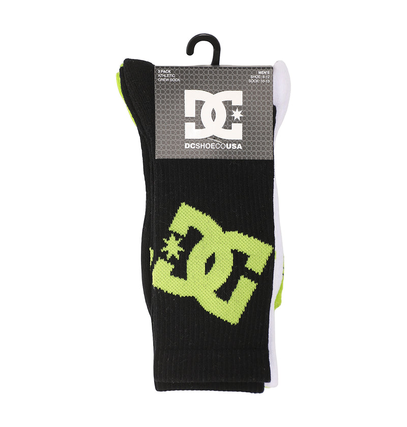 A 3-pack of DC Shoes Graffik Logo Crew Socks in black, each featuring a large yellow-green DC logo, displayed in retail packaging with a hanger and top label.