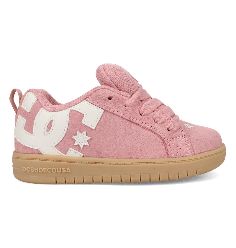 The Kids' Court Graffik Shoes by DC Shoes feature a pink suede upper, classic puffy silhouette, thick tan rubber sole, white DC logo on the side, matching pink laces, and "DCSHOECOUSA" printed in white on the heel.