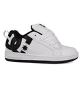 The DC Shoes Kids' Court Graffik Shoes feature a white and black low-top skate style with a thick sole, white laces, black DC logo on the side, and a convenient heel loop—ideal for kids.