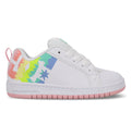 The Kids' Court Graffik Shoes by DC Shoes feature white uppers and laces, a pink sole, pixelated rainbow side graphics fading from yellow to green, blue, and pink, plus pink accents on the heel tab and outsole.