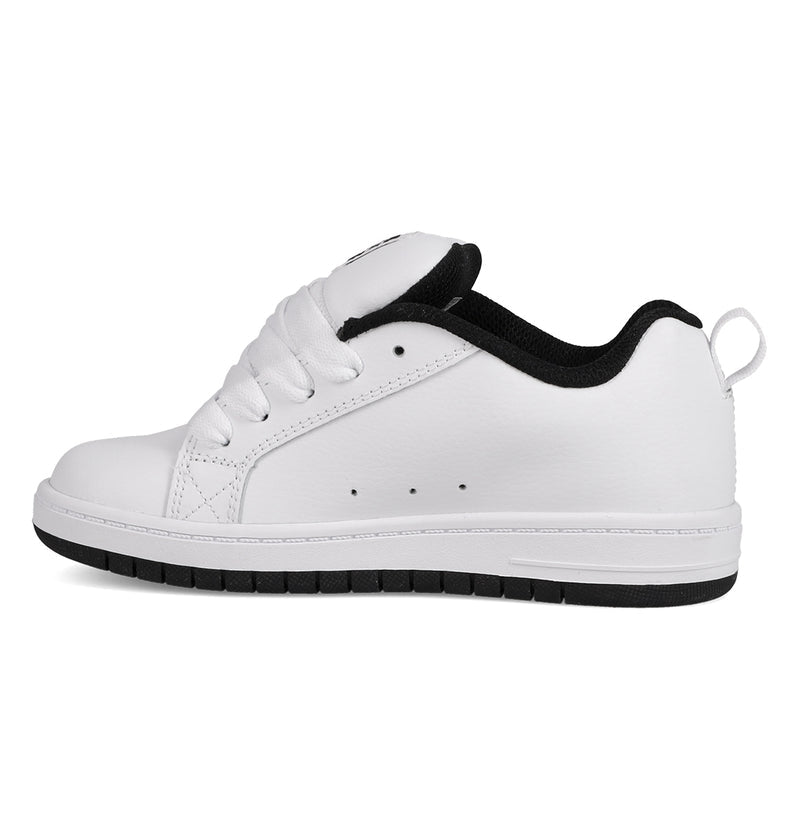 The Kids' Court Graffik Shoes by DC Shoes feature a white, skate-inspired design with black interior lining, white laces, a white sole with a black bottom edge, and heel pull tab—shown in side profile, perfect for kids' collections.