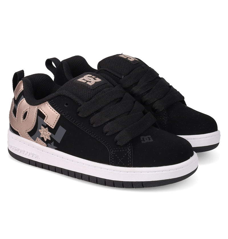 A pair of Kids' Court Graffik Shoes by DC Shoes with a classic puffy silhouette, thick black laces, white midsoles, and metallic bronze DC logos on the sides and tongue, displayed side by side on a white background.