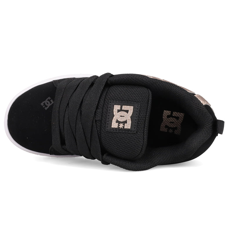 The Kids’ Court Graffik Shoes by DC Shoes are black skate shoes with a classic puffy silhouette, thick black laces, a padded tongue showcasing the beige DC logo, and beige logo accents on the mostly black upper.