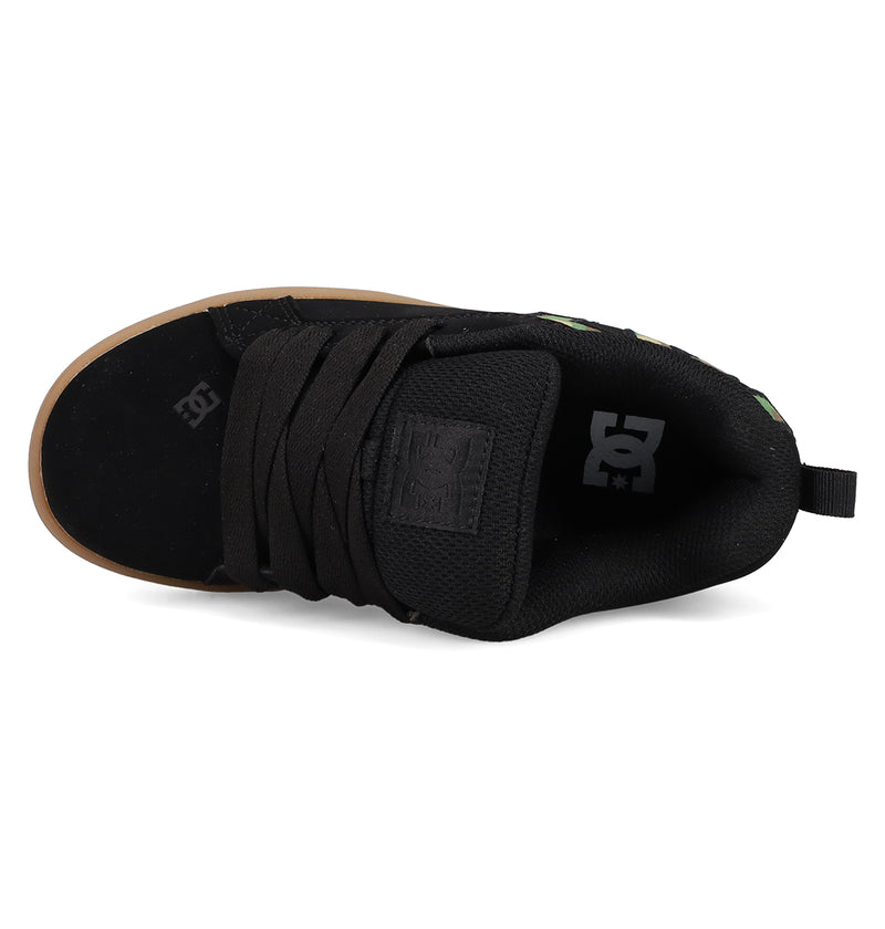 Top view of the DC Shoes Kids' Court Graffik skate shoe in black, featuring wide black laces, a brown sole, and visible DC logos on the insole and toe, all with a classic puffy silhouette.