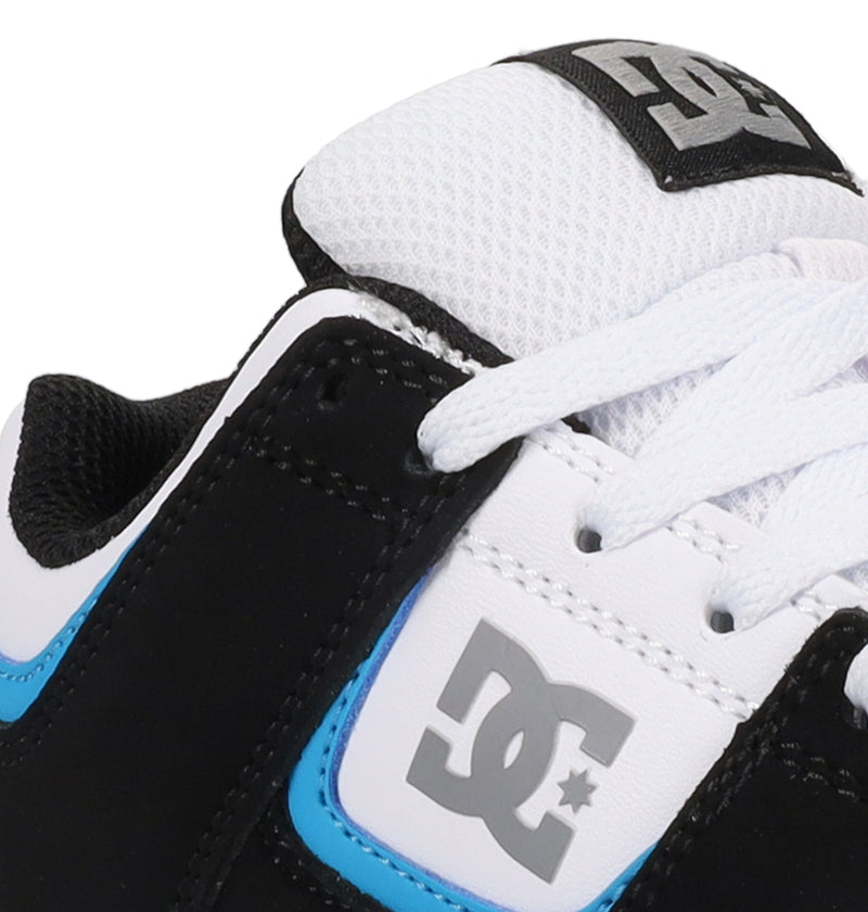 Close-up of the DC Shoes Cure in black, white, and blue with white laces and gray DC Shoes logos on the tongue and side.