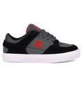 The Kids' Onyx Shoes by DC Shoes feature a black and gray vulc style with a white sole, red side logo, gray laces, and mesh ankle details—perfect low-tops for kids seeking everyday comfort and standout style.
