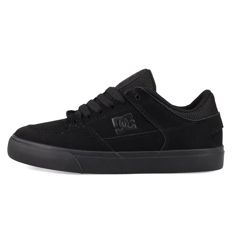 The Kids' Onyx Shoes by DC Shoes feature a minimal black silhouette with lace-up front, textured sole, and logo. Made from durable suede and mesh, they're the perfect comfortable choice for everyday skate sessions.