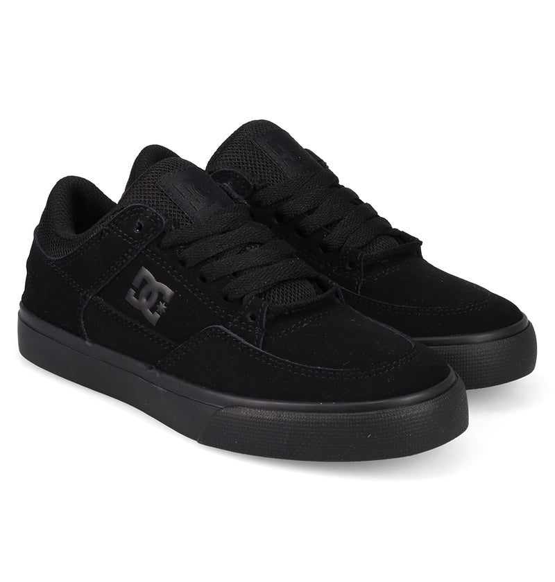The DC Shoes Kids' Onyx Shoes feature a minimal black design with black laces and the DC Shoes logo on the side—perfect for everyday wear, shown on a white background.
