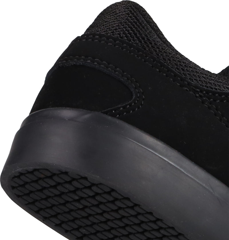 Close-up of the heel and sole of the Kids' Onyx Shoes by DC Shoes—everyday essentials with a minimal silhouette, textured rubber outsole, and suede upper.