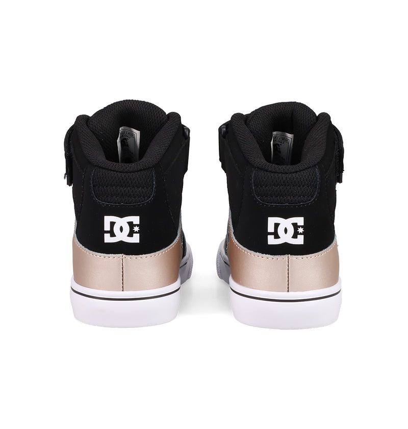 A pair of DC Shoes Kids' Pure Hi Top EV Shoes seen from the back, featuring black uppers, metallic gold heel panels, white vulcanized soles, and white DC logos on the heels.