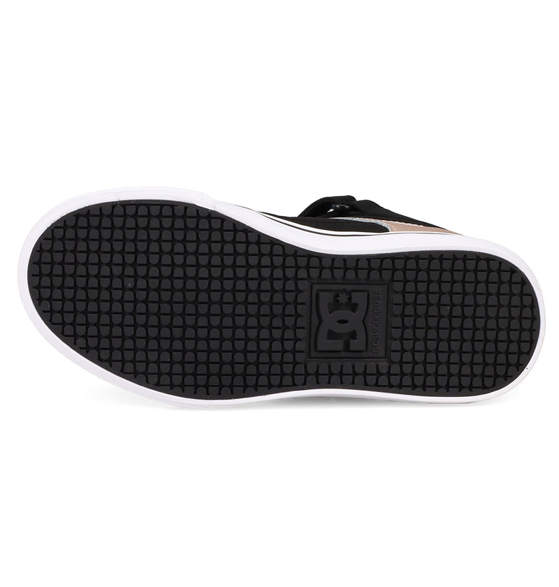 The image shows the black rubber sole of DC Shoes' Kids' Pure Hi Top EV skate shoe, featuring a textured tread pattern, a rectangular logo inset near the heel, and a vulcanized outsole bordered by a white edge.