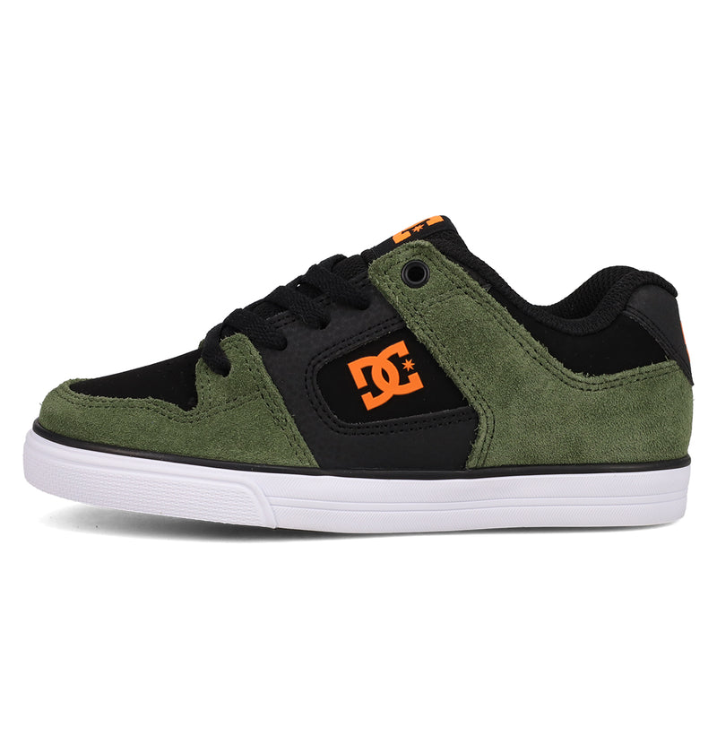 The Kids' Pure Shoes by DC Shoes feature a black and green design, white sole, orange DC logo, black laces, and green suede accents—perfect for everyday style and comfort.