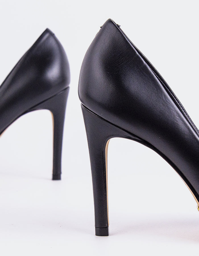 Chic Low Heel Pump
Designed for effortless elegance, this low heel pump offers the perfect balance of style and comfort. Its understated silhouette makes it ideal for both professional and casual settings, while the modest heel provides all-day wearability without compromising on sophistication. A go-to option for polished, everyday wear.

Detail(s):&nbsp;

Pointy Toe
3.75” Straight Stiletto Heel
We recommend sizing up, as this item runs small.

Material(s):&nbsp;

Genuine Leather Upper&nbsp;
Padded Leather