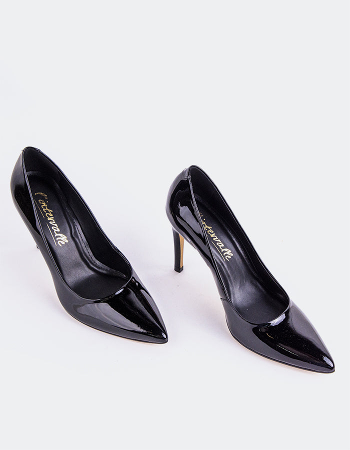 Chic Low Heel Pump
Designed for effortless elegance, this low heel pump offers the perfect balance of style and comfort. Its understated silhouette makes it ideal for both professional and casual settings, while the modest heel provides all-day wearability without compromising on sophistication. A go-to option for polished, everyday wear.

Detail(s):&nbsp;

Pointy Toe
3.75” Straight Stiletto Heel
We recommend sizing up, as this item runs small.

Material(s):&nbsp;

Patent Leather Upper&nbsp;
Padded Leather