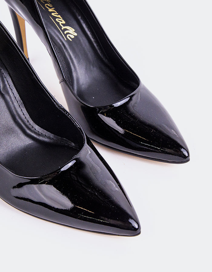 Chic Low Heel Pump
Designed for effortless elegance, this low heel pump offers the perfect balance of style and comfort. Its understated silhouette makes it ideal for both professional and casual settings, while the modest heel provides all-day wearability without compromising on sophistication. A go-to option for polished, everyday wear.

Detail(s):&nbsp;

Pointy Toe
3.75” Straight Stiletto Heel
We recommend sizing up, as this item runs small.

Material(s):&nbsp;

Patent Leather Upper&nbsp;
Padded Leather