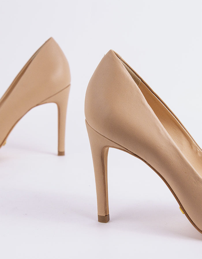 Chic Low Heel Pump
Designed for effortless elegance, this low heel pump offers the perfect balance of style and comfort. Its understated silhouette makes it ideal for both professional and casual settings, while the modest heel provides all-day wearability without compromising on sophistication. A go-to option for polished, everyday wear.

Detail(s):&nbsp;

Pointy Toe
3.75” Straight Stiletto Heel
We recommend sizing up, as this item runs small.

Material(s):&nbsp;

Genuine Leather Upper&nbsp;
Padded Leather