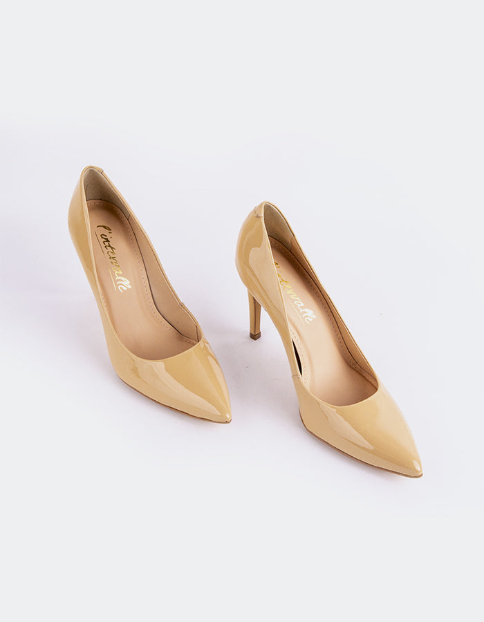 Chic Low Heel Pump
Designed for effortless elegance, this low heel pump offers the perfect balance of style and comfort. Its understated silhouette makes it ideal for both professional and casual settings, while the modest heel provides all-day wearability without compromising on sophistication. A go-to option for polished, everyday wear.

Detail(s):&nbsp;

Pointy Toe
3.75” Straight Stiletto Heel
We recommend sizing up, as this item runs small.

Material(s):&nbsp;

Patent Leather Upper&nbsp;
Padded Leather