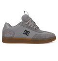 The Men's Astrix Shoes by DC Shoes feature a grey suede and mesh upper, gum rubber sole for board control, black DC logo on the side, grey laces, and a tongue pull tab—ideal for street skateboarding.
