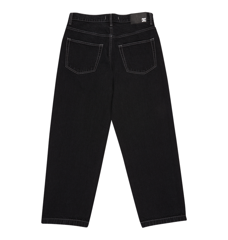 Back view of DC Shoes Men's Baggy Denim Pant in black heavyweight denim with white stitching, two back pockets, and a black waistband label, shown on a white background.