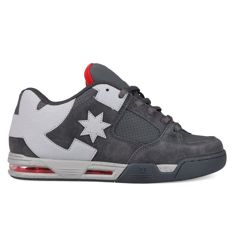 The Men's DC Command Shoes by DC Shoes feature a gray and white design with red accents on the heel, star and arrow logo, perforated upper, and visible air cushioning, combining skate heritage with a street-ready look.