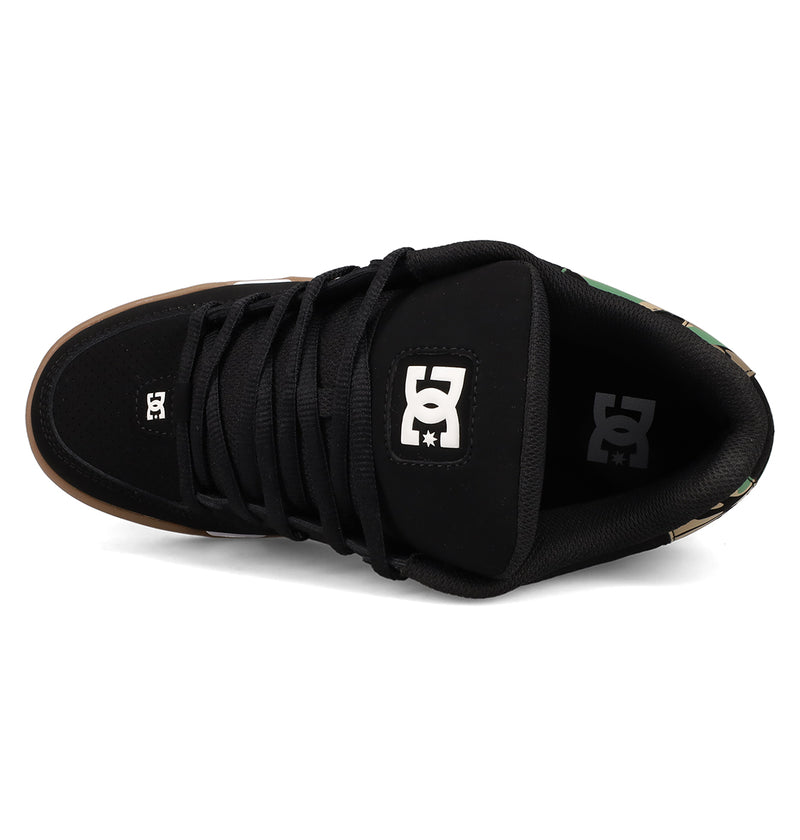 The Men's DC Command Shoes by DC Shoes feature a black upper with black laces, a gum sole edge, and the white DC logo on the tongue and insole. This low-top offers padded comfort and classic skate-inspired design.