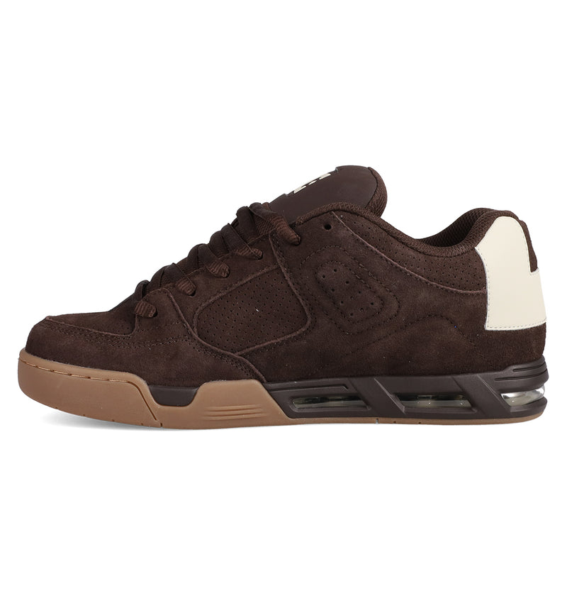 The Men's DC Command SE Shoes by DC Shoes feature brown suede, a low-top design, gum rubber sole, signature heel cushioning, and a white-accented back heel tab—blending classic style with modern comfort technology.