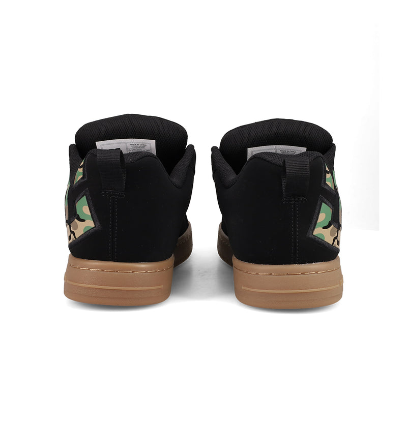 A pair of DC Shoes Men's Court Graffik in black and green camo with brown soles and a puffy silhouette, displayed from the back on a white background.