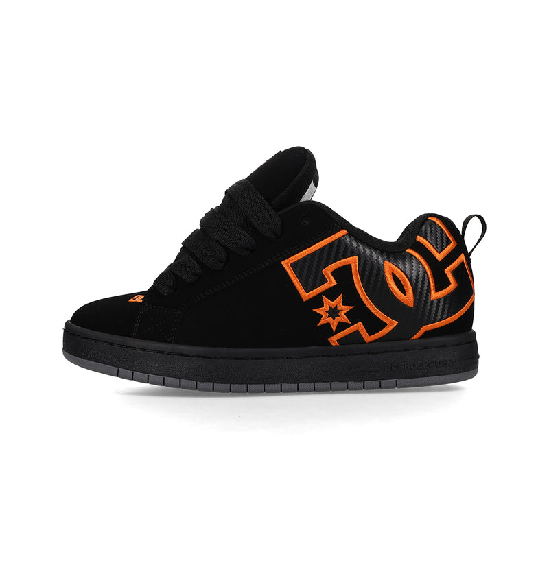 The DC Shoes Men's Court Graffik features a black, puffy skate silhouette, thick black laces, gray sole, bright orange side logo, low-profile design, and a heel pull tab.