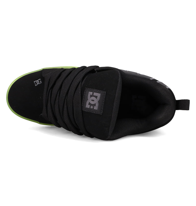 Top view of DC Shoes Men's Court Graffik SE Shoes in black with thick laces, green toe edge, and logo on the tongue, crafted with premium uppers for lasting comfort.