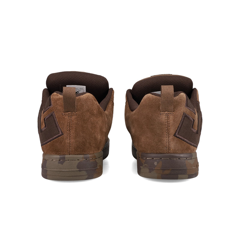 The DC Shoes Men's Court Graffik SE features a puffy silhouette, brown suede uppers, dark brown accents, geometric heel detail, and brown camo-patterned soles—all viewed from the back.