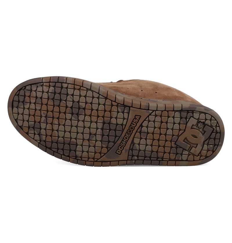 The Men's Court Graffik SE Shoes by DC Shoes feature a brown sole with a multicolored, tile-like tread and the DC logo and website near the heel, perfectly matching their puffy silhouette for a bold, trendy style.