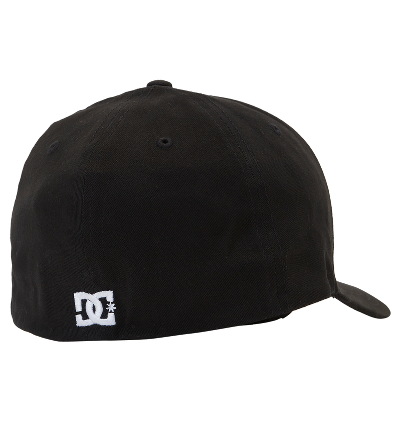 The Men's DC Cap Star by DC Shoes is a black skate cap with a curved brim and ventilation eyelets, featuring a small white embroidered DC branding logo near the back bottom edge.