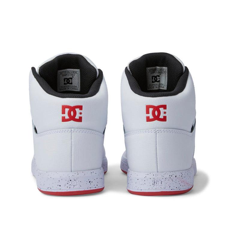 The Men's DC Cure High-Top Shoes by DC Shoes feature a white leather design, black inner lining, red DC logos on the heels, speckled white midsoles, and red outsoles for stylish comfort.